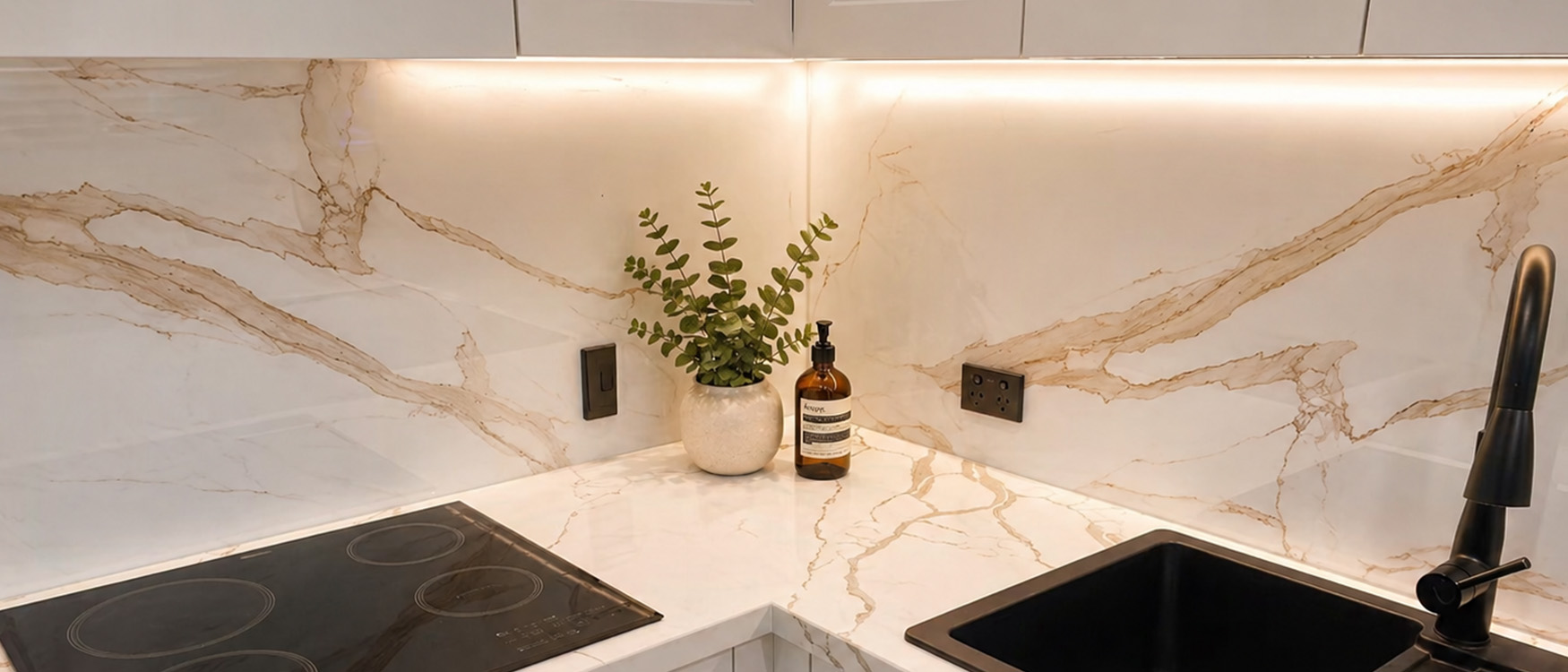 Glass splashback in modern kitchen