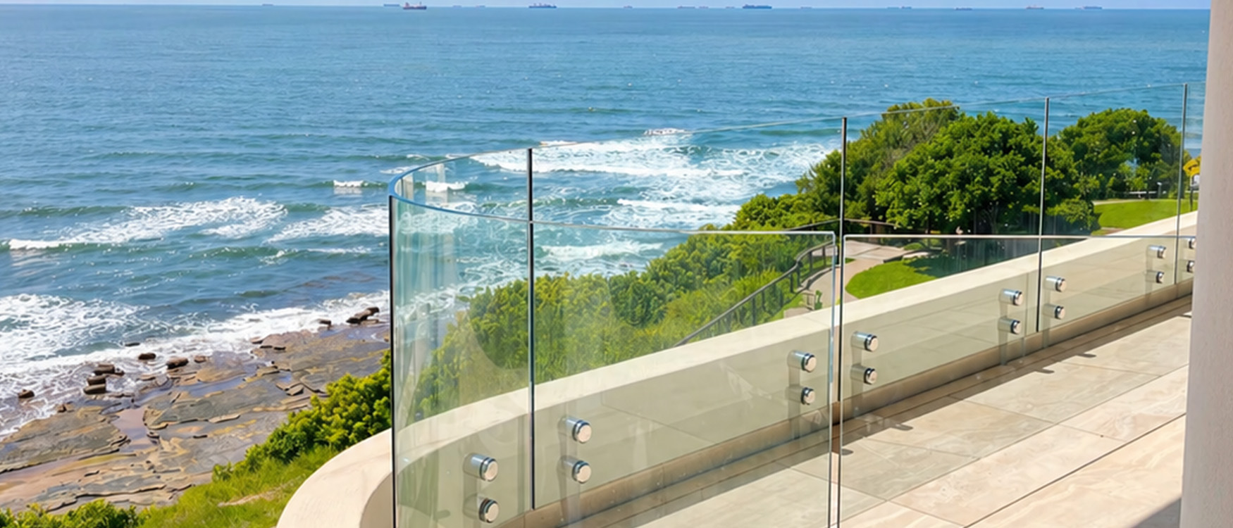 Residential glass balustrading overlooking the coast